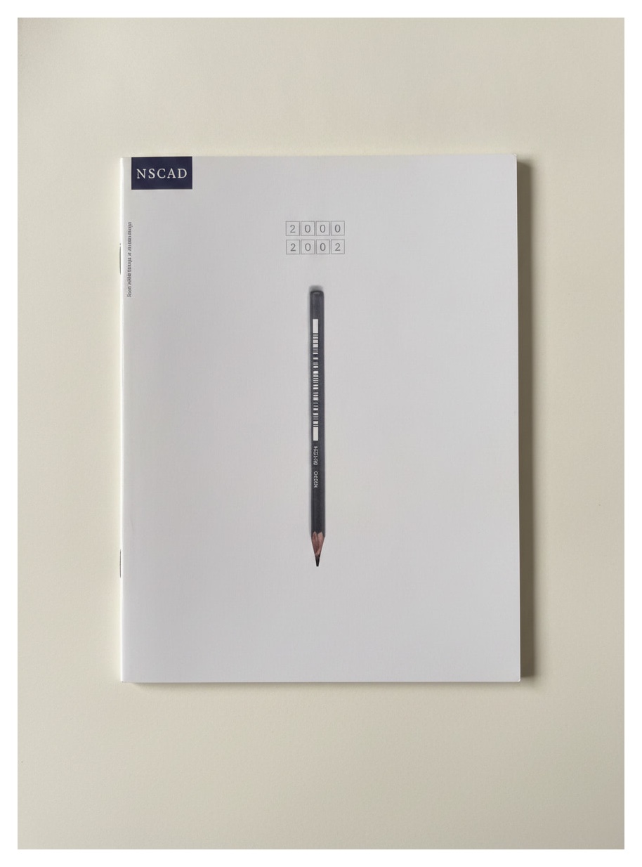NSCAD Academic Calendar 2000–2002 cover, a single pencil, barcode along its barrel, on a white field